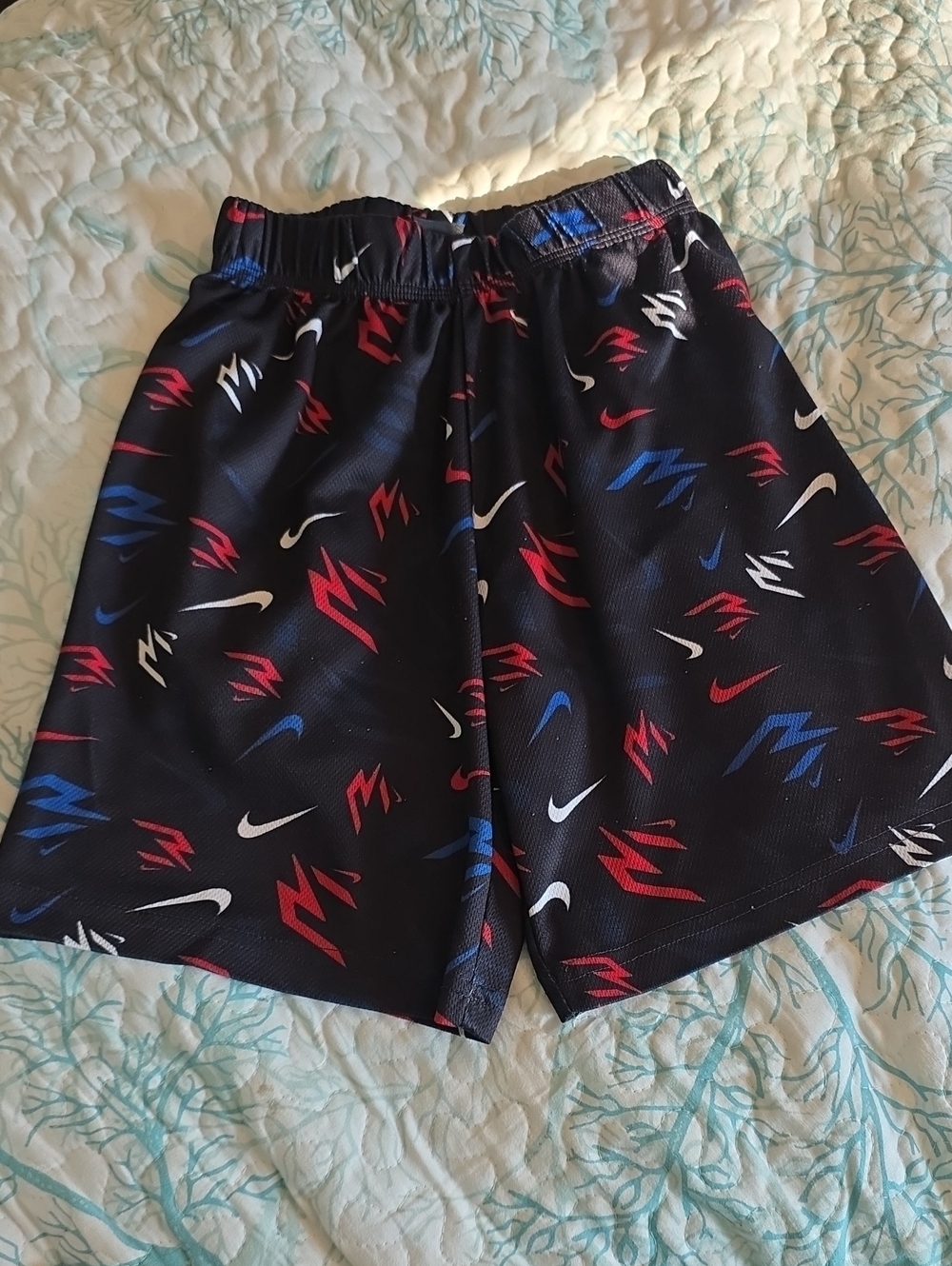 Nike Black Kids' Shorts with Red, Blue & White Graphics (8/10)